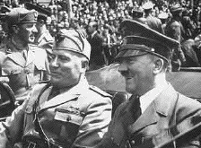 Mussolini with
Hitler in open
car
